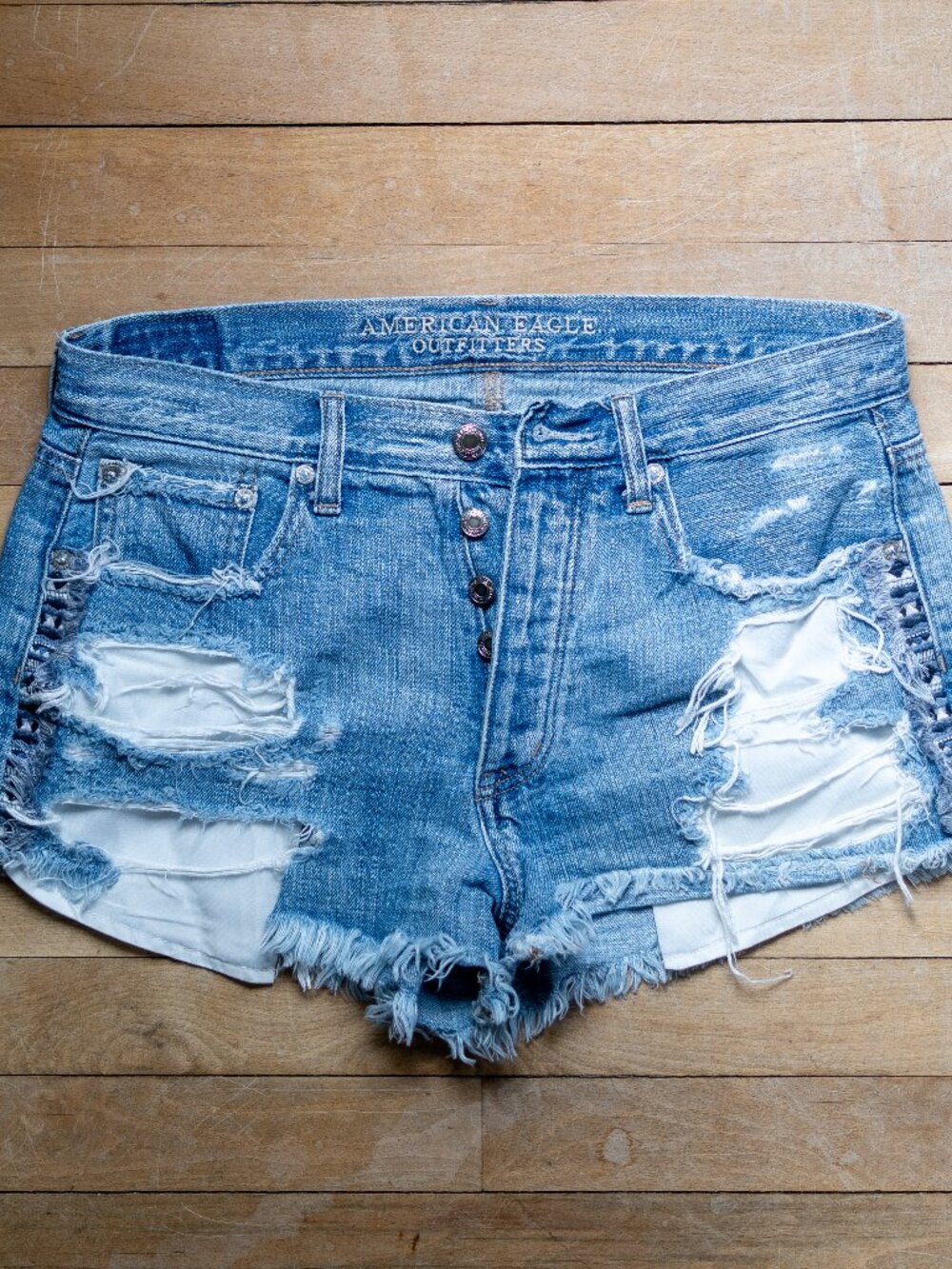 American Eagle Distressed Mid-Rise Shorts with Embroidery